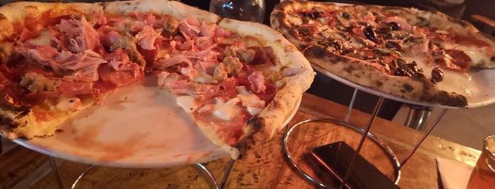Pizza Boccone is one of Lugares favoritos de Ben.