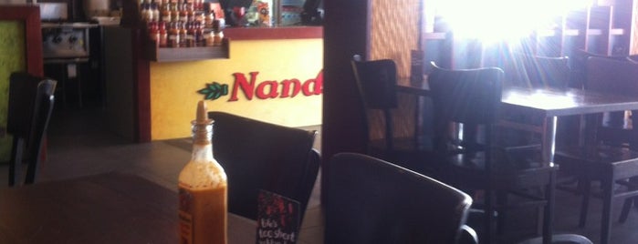 Nando's is one of Locais curtidos por João.