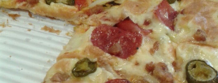 Domino Pizza Pondok Gede is one of Lugares favoritos de Dee.