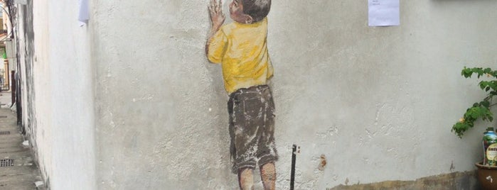 Penang Street Art : Boy on Chair is one of Penang Street Art.