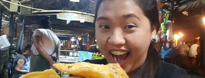 Plaza Burgos Empanada Stands is one of สถานที่ที่บันทึกไว้ของ Kimmie.