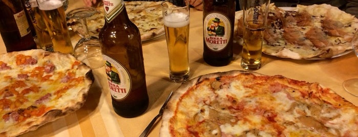 Pizzeria Torricelli & Giusti is one of Tempat yang Disukai andtrap.