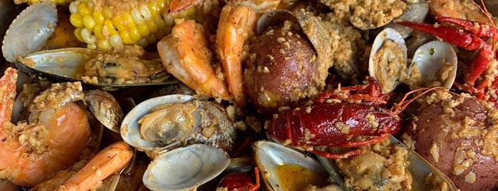 Crab King Cajun Boil & Bar is one of Orte, die Stacy gefallen.