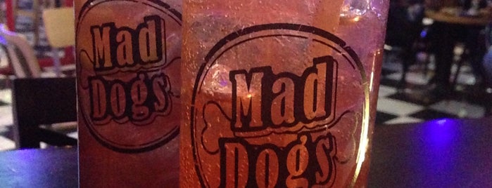 Mad Dogs is one of Locais curtidos por Stacy.