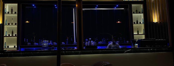 Joe's Café is one of العقيق.