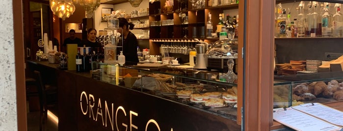 Orange Café is one of สถานที่ที่บันทึกไว้ของ Kimmie.