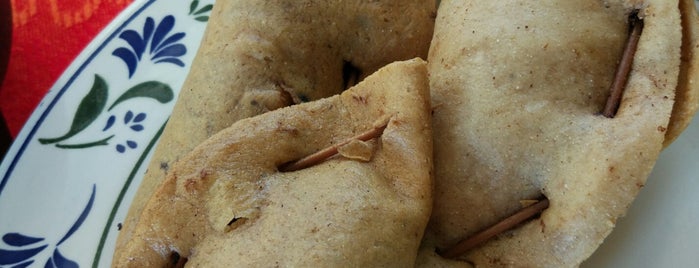 Carnitas nachos is one of Tempat yang Disukai Oscar.