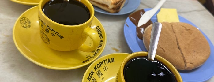 Chong Kok Kopitiam 中国酒店 is one of Eric's Favourite Coffee Places.