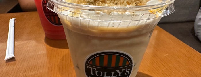 Tully's Coffee is one of สถานที่ที่ ヤン ถูกใจ.