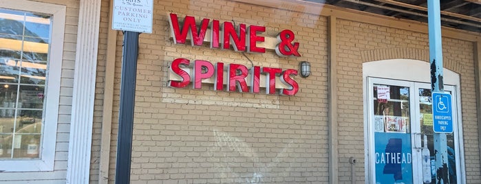 Wine & Spirits In The Quarter is one of Lugares favoritos de Scott.