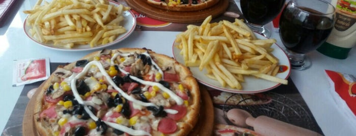 Pasaport Pizza is one of สถานที่ที่ Mustafa Ahmet ถูกใจ.