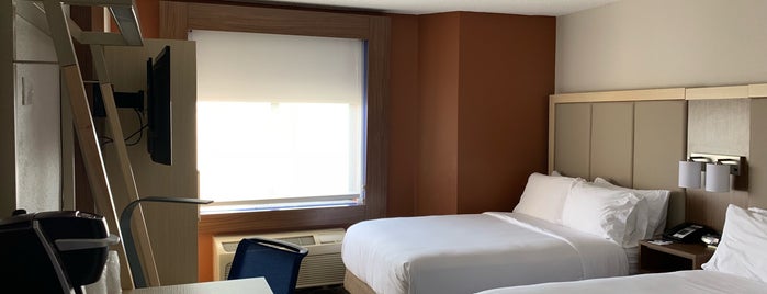 Holiday Inn Express & Suites is one of Travel.