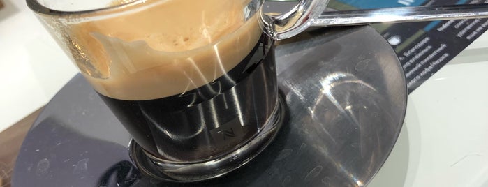 Nespresso is one of Locais curtidos por Tema.