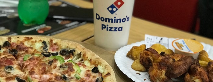 Domino's Pizza is one of Locais curtidos por Jacob.