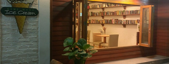 This is a Book Cafe is one of Tempat yang Disukai Brad.