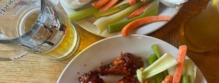 The Wing Cafe and Tap House is one of Happy Hours.