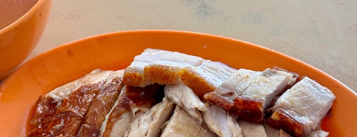 Chicken Rice Shop (兴发烧腊饭店) is one of Chinese food.
