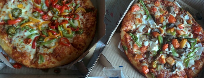 Domino's Pizza is one of Places.