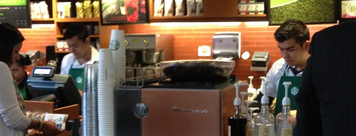 Starbucks is one of Carlos : понравившиеся места.
