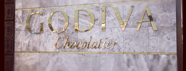 Godiva Chocolatier is one of Lieux qui ont plu à Ronald.