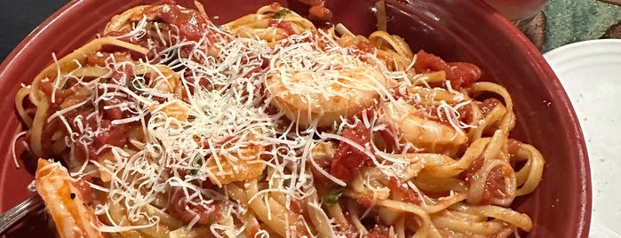 Carrabba's Italian Grill is one of Places to go.