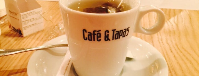 Café & Tapas is one of Tempat yang Disukai Arianna.