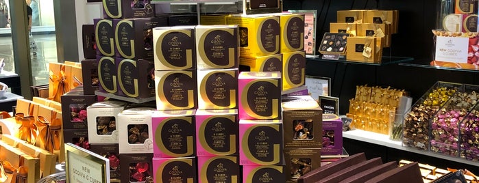 Godiva Chocolatier is one of Lugares favoritos de Brian.