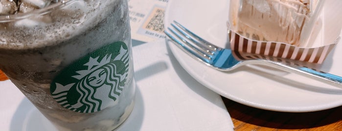 星巴克 Starbucks is one of Lugares favoritos de Josh.