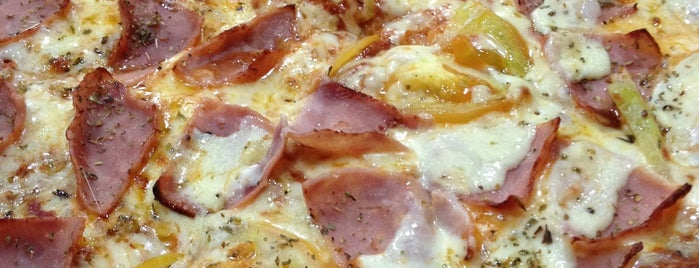 Domino's Pizza is one of Comida.