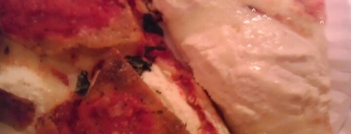 Gino's Pizza is one of Locais curtidos por Tim.