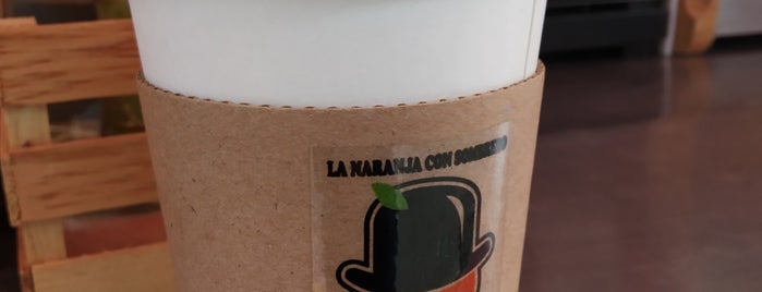 La Naranja Con Sombrero is one of Locais curtidos por gaby.