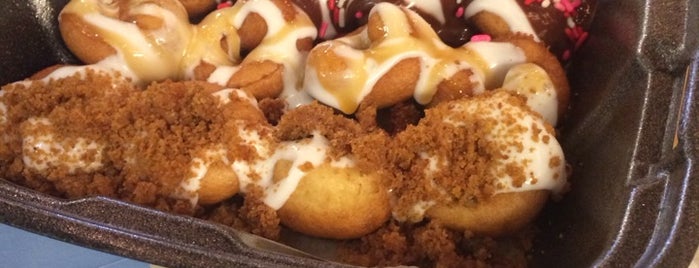 Mahalo's Coffee & Mini Donuts is one of Posti che sono piaciuti a Cathy.