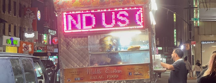 Halal Food Stand (across from Pizza Wagon) is one of Been there.