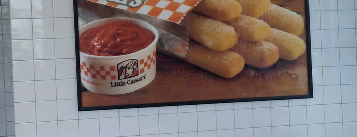 Little Caesars Pizza is one of Food Places.