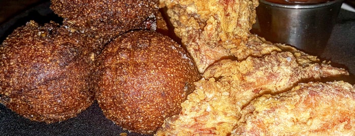 Slow Bar is one of Golden, Brown, & Delicious - A Fried Chicken Guide.
