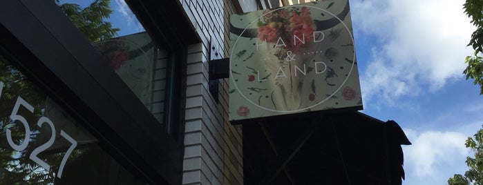 Hand and Land is one of Signage.