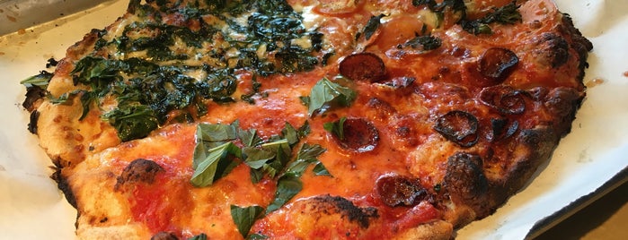 Tomatoes Apizza is one of GQ's 25 best pizzas in america.