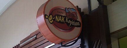 Enak Cafe is one of Food.