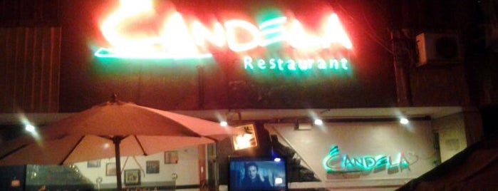 Candela Cafe is one of Cafés.