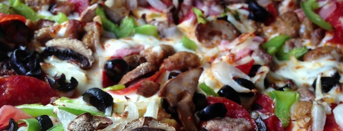 Domino's Pizza is one of Favorite Restaurants and Bars.