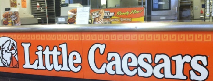 Little Caesars Pizza is one of สถานที่ที่ The1JMAC ถูกใจ.