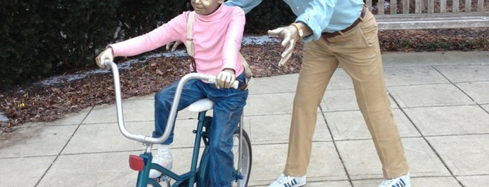 Dad and Daughter Bicycle Statue is one of Carmel Statues.
