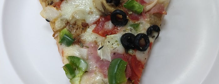 Giorgio's Pizza is one of Places to eat downtown!.
