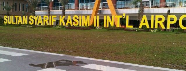 Bandar Udara Internasional Sultan Syarif Kasim II (PKU) is one of Pekanbaru City Badge - Kota Bertuah.