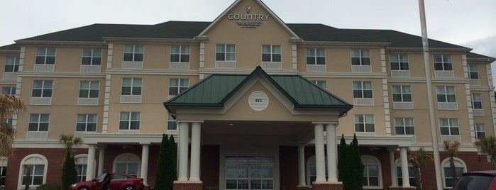 Country Inn & Suites By Radisson, Braselton, GA is one of สถานที่ที่ Chester ถูกใจ.
