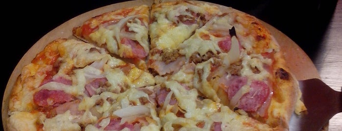 Green's Pizza & Subs is one of Comida vegetariana y vegana / Vegetarian and vegan.