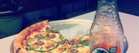 Romano's Pizzeria & Taqueria is one of Posti che sono piaciuti a Niki.