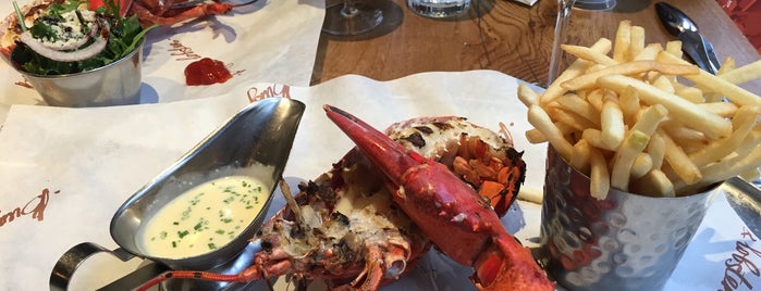 Burger & Lobster is one of Y’s Liked Places.