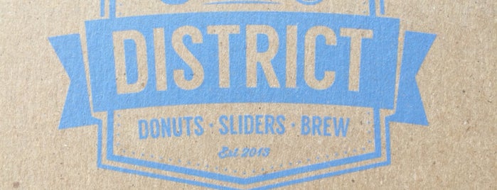 DISTRICT. Donuts. Sliders. Brew. is one of Locais curtidos por Sara.