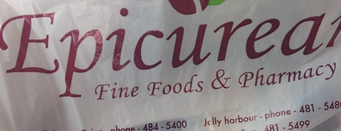 Epicurean Fine Foods and Pharmacy is one of Orte, die TheDL gefallen.
